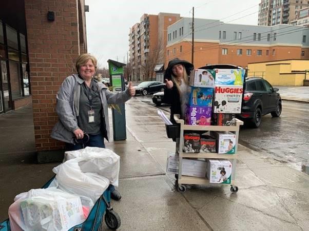 Centretown CHC: Jennifer and Vanessa loading up supplies to bring to families living in a shelter